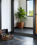 6 Pack Adjustable Door Closer Springs With Bent Tube And Hook lay on floor, door in background