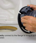 Hands installing No Wax 4 Inch Toilet Flange Repair Kit With Spacer, Offset Bolts And Seal Gauge on a bathroom floor