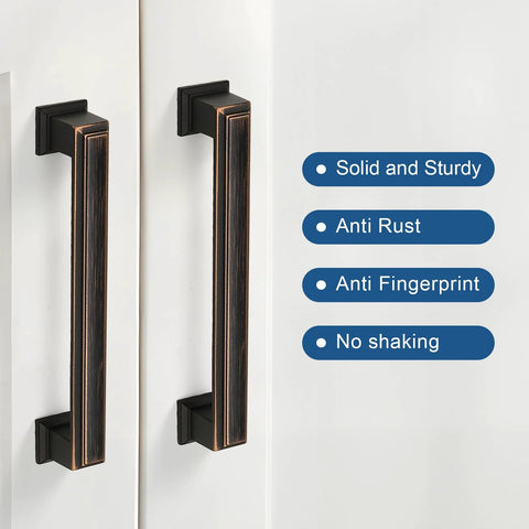 Oil Rubbed Bronze Cabinet Pulls 10 Pack 5 Inch Hole Center Heavy Duty Kitchen And Furniture Handles installed on white cabinet door