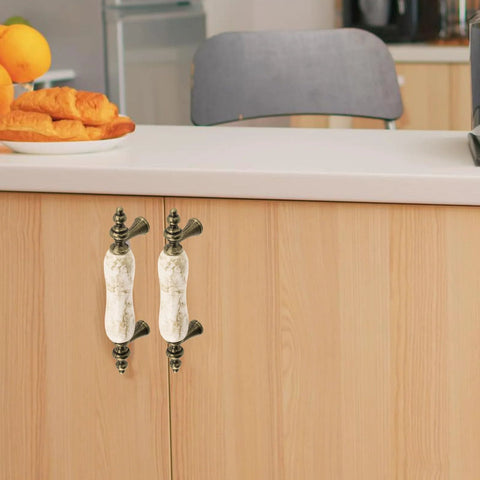 Ceramic Cabinet Pulls Marble Pattern 3 Inch Center Holes Antique Brown Granite Look installed on kitchen cabinet