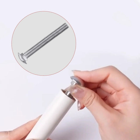 Hand holding a screw for the Eight Piece Color Guard Weight Anchor Set Featuring Sturdy Flag Pole Caps And Reliable Black White Electrical Tape.