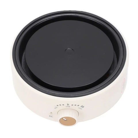 Compact Digital Induction Hot Plate For Boiling Water And Warming Tea Perfect Coffee Station Setup Great For Dorm Rooms And Office Desks US Plug 110V Portable Electric Heating Mat showing top view of the black heating surface and control knob.