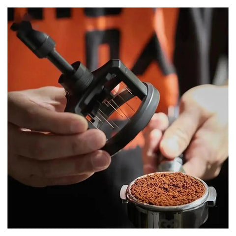 Slick Adjustable Coffee Distribution Tool And Rotatable Espresso Tamper Set For Badass Baristas 51 54 58 Millimeter Compatible in action.