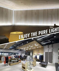 Quad Row 24V DC LED Strip Light Daylight White 90 CRI illuminating retail shop interior with bright white lighting
