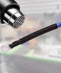 Applying heat to wire with black Heat Shrink Tubing Kit 328 Piece Assortment For Electrical Insulation And Wire Protection Black Red Sleeving