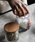 Top Shelf Pantry Game Changer Clear Glass Storage Jar securely sealed, great for storing dry goods like sugar and tea leaves.