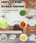 Le d Affaires 5-in-1 hand-crank kitchen grater and slicer in green with multiple blades for cheese, vegetables and fruit
