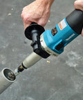 Heavy Duty Quarter Inch Sjs Die Grinder With Six Point Six Amp Motor Pushing Up To Twenty Eight Thousand Rpm Variable Speed Trigger in use on metal pipe.