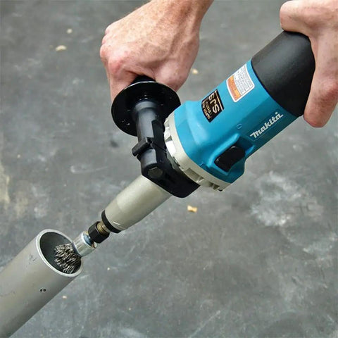 Heavy Duty Quarter Inch Sjs Die Grinder With Six Point Six Amp Motor Pushing Up To Twenty Eight Thousand Rpm Variable Speed Trigger in use on metal pipe.