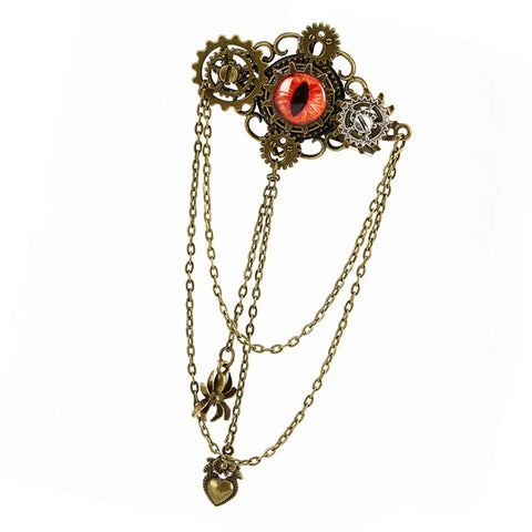 Epic Unisex Steampunk Hair Clip With Spinning Gears And Creepy Devil Eye Brooch For Halloween Costumes Or Gothic Daily Style Antique Gold Metal Alloy Jewelry Accessory with chains and eye detail.