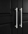 Matte Black Escutcheon Back Plates For Cabinet Knobs And Doors Four Pack Round Rosette Plate Two And One Third Inch Heavy Duty Die Cast Zinc Ideal For Bifold Closet Doors Door Pulls And Handles installed on black cabinet