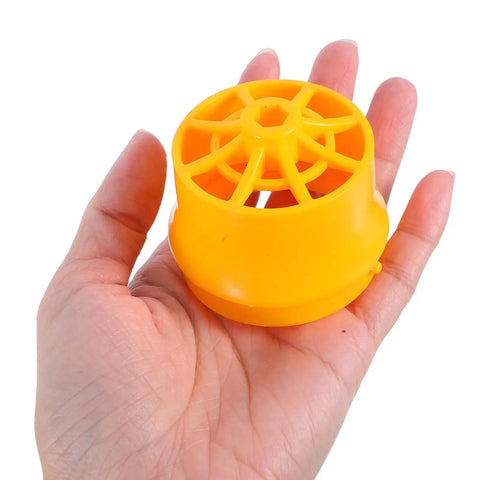 Heavy Duty 1/2 And 3/4 Inch Pipe Threader Kit For Water Pipes showing plastic yellow threading adapter held in a hand.