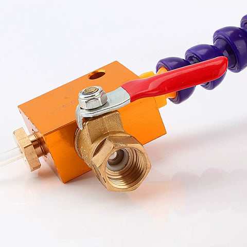 Close-up of brass nozzle and valve of the adjustable mist coolant sprayer for CNC machines and lathes.