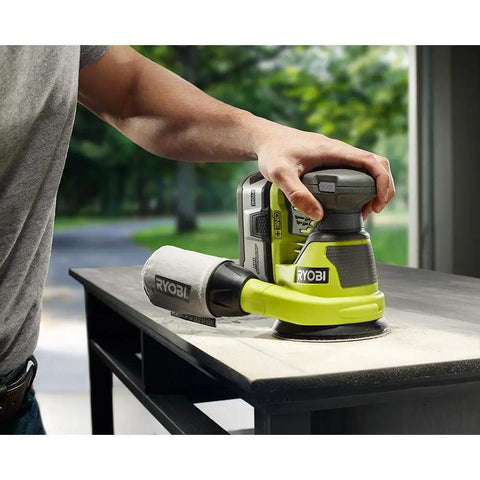 One Plus Compatible 18V Cordless 5 Inch Random Orbit Sander Tool Only with Hook and Loop Pads in use on table surface
