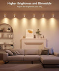 Living room featuring Modern Cube Wall Sconces With Adjustable Cable Distance And Smart RGBic LED Fixture That Hooks Up To Alexa.