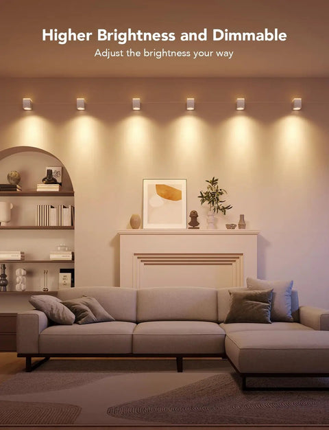 Living room featuring Modern Cube Wall Sconces With Adjustable Cable Distance And Smart RGBic LED Fixture That Hooks Up To Alexa.