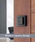 Front Door Deadbolt With SmartKey Rekey Technology And Microban Protection In Matte Black installed on wooden door