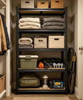 Kickass Heavy Duty 5 Tier Metal Storage Shelving Unit With Reinforced Adjustable Steel Racks For Garage Pantry Warehouse Industrial Tool Organization Setup filled with blankets, bins, and tools.