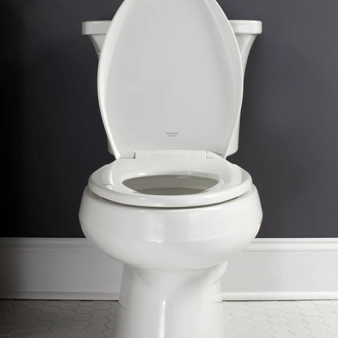 Soft Close Toilet Seat With Easy Clean Hinges Adjustable Front To Back Fit Round White Plastic Seat in modern bathroom setting