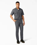 Badass Men Short Sleeve Utility Button Down Workshirt In Charcoal With Stain Resistant Cotton Polyester Blend For Tough Job Site Grind and Easy Relaxed Fit That Handles Every Day Hustle, modeled standing.