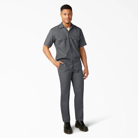 Badass Men Short Sleeve Utility Button Down Workshirt In Charcoal With Stain Resistant Cotton Polyester Blend For Tough Job Site Grind and Easy Relaxed Fit That Handles Every Day Hustle, modeled standing.
