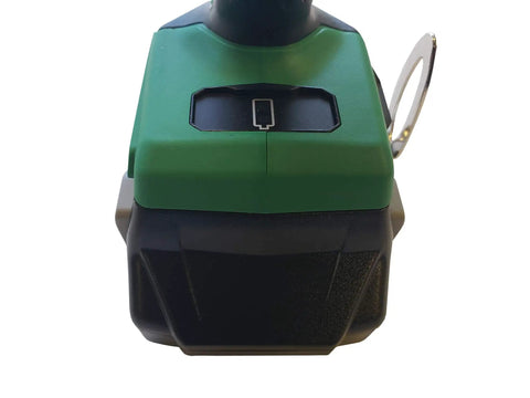 Powerhouse 18V Cordless Brushless Impact Driver charging interface with green top and black base for fastening and drilling