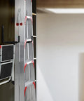 Heavy Duty Garage Hooks With 9 Inch Jumbo Arm Wall Mount Organizer holding ladder and chair for garage storage