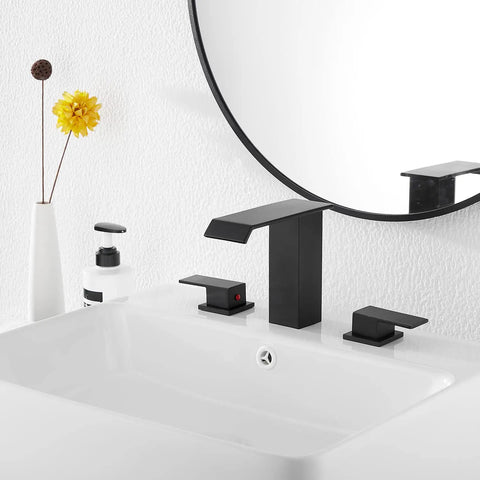 Matte Black Waterfall Bathroom Faucet, Widespread 3 Hole 2 Handle Modern Sink Faucet With Pop Up Drain installed on white sink