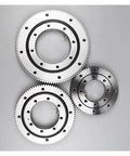 Heavy Duty External Gear Turntable Bearing Rock Solid Slewing Ring Assembly showing three sizes with precision gearing and low friction.