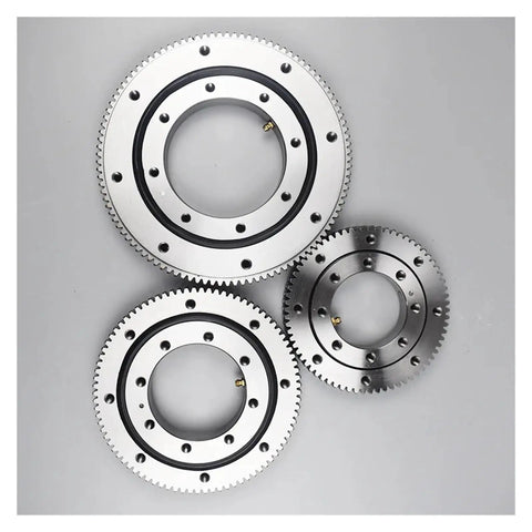 Heavy Duty External Gear Turntable Bearing Rock Solid Slewing Ring Assembly showing three sizes with precision gearing and low friction.