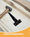Eight-Piece Black Zinc Alloy T-Shaped Gate Hinges With Triangular Support, shown with hammer on wooden surface