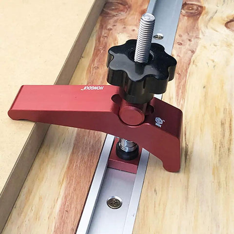 Rock Solid Aluminum T Track Hold Down Clamps For Woodworking And Metalworking Projects Plus Quick Slide In T Slot Press Clamps with grip on workbench.
