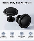 Matte Black Round Euro Style Cabinet Knobs One And One Quarter Inch 30 Pack, zinc alloy round knobs shown front and side
