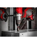 Heavy Duty 3Pc Titanium Step Drill Bit Kit With Impact Ready Dual Flutes And Rapid Strike Tip For Faster Holes In Metal Sheets And Panels Made To Last Longer Than Standard Bits. Step bit drilling metal panel with drill