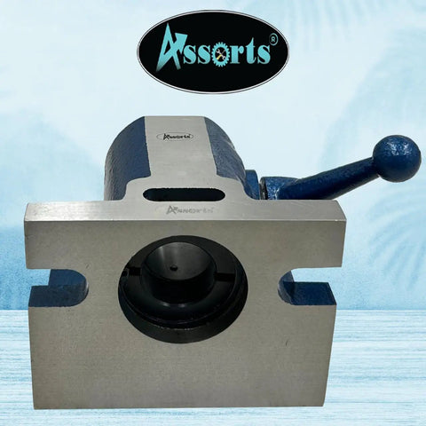 Heavy Duty 5C Collet Holding Fixture With Quick Release Lever Design For Horizontal Or Vertical Machining Setup and Rock Solid Workpiece Clamping Grip Around The Shop Floor, with 5-inch base and steel frame.