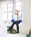 Child on heavy duty kids rope swing seat for indoor and outdoor play with secure hooks and straps 440 lb capacity blue swing