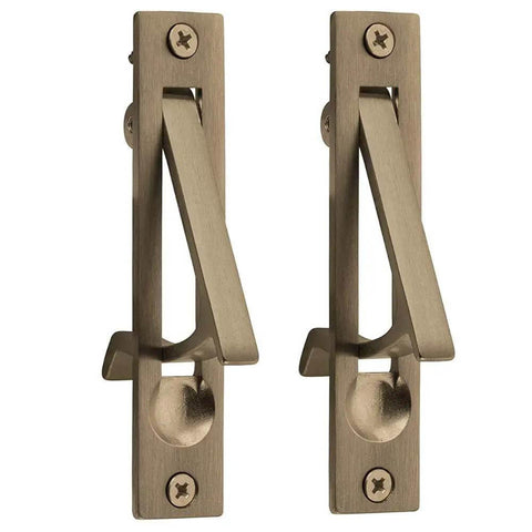 2 Pack Edge Pull Latch Set For Barn And Pocket Doors In Antique Brass Finish shown in a front view