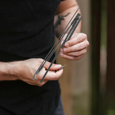 Person holding Two Piece Heavy Duty Steel Folding Umbrella Repair Kit Eight Bone Replacement Parts for swift fixes.