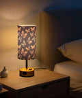 Watercolor Butterfly Decor Bedside Lamp With 3 Way Dimmer And Touch Control Charging Station lit on nightstand