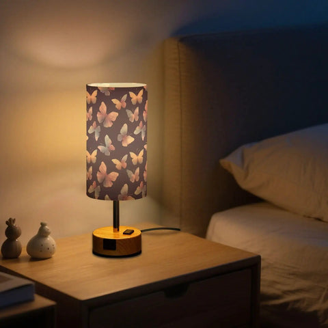 Watercolor Butterfly Decor Bedside Lamp With 3 Way Dimmer And Touch Control Charging Station lit on nightstand