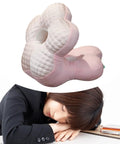 Go-To Travel Napping Pillow With Face Cradle in use, supporting a person's head comfortably, ergonomic design visible