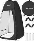 Portable Pop Up Shower Tent With Instant Privacy Dressing Room for camping, black, includes ropes and stakes for outdoor setup.