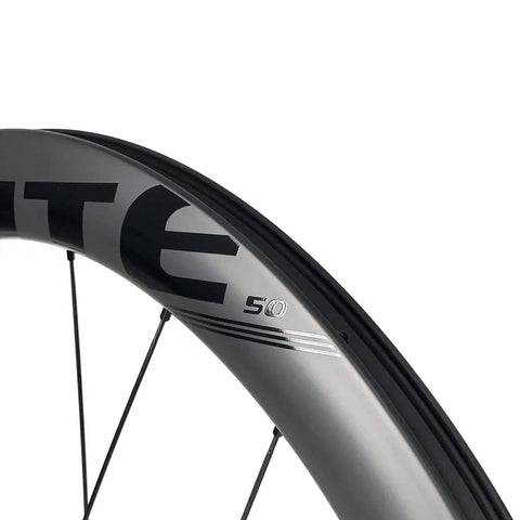 Close-up of 50mm Matte Carbon Road Wheelset With Center Lock Disc Brakes 700c Beefy 28mm Rim Fits 25C To 38C Tires UCI Approved