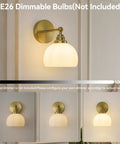 Feasey Vintage Milk Glass Globe Wall Sconce, Mid Century Ribbed Glass Light mounted on wall with brass fixture and dimmable bulb.