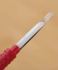 Close-up of Beekeeping Grafting Tools Kit retractable needle for queen larva rearing with red grip, lightweight and durable.