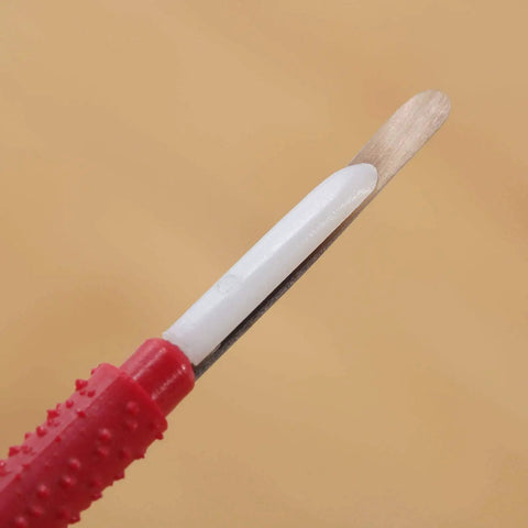 Close-up of Beekeeping Grafting Tools Kit retractable needle for queen larva rearing with red grip, lightweight and durable.