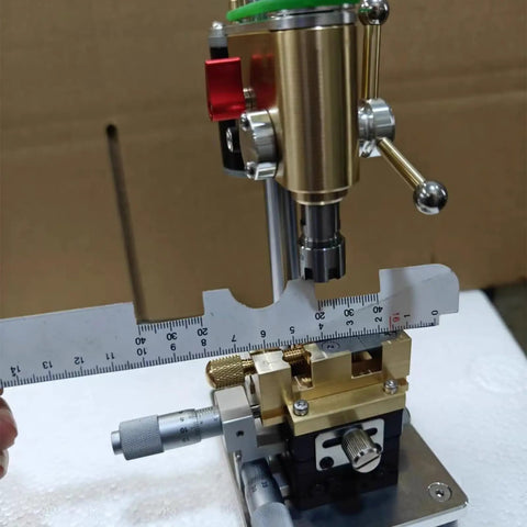 Joverex Multifunction Micro Watch Bench Drill Press With Adjustable Voltage And Variable Speed Up to 9500Rpm showing brass components and measuring tool.