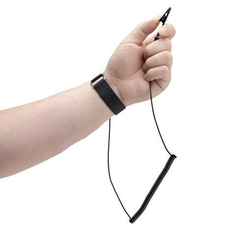 Hand wearing ESD Wrist Strap With Grounding Cable And Detachable 5ft Cord For Safe Static Discharge Reducing Shock Risk With 1M Ohm Resistor