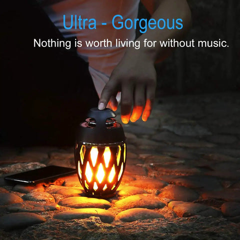 LED Flame Outdoor Table Lamp With Bluetooth Speaker Rechargeable Ambience Lantern emitting warm flickering light