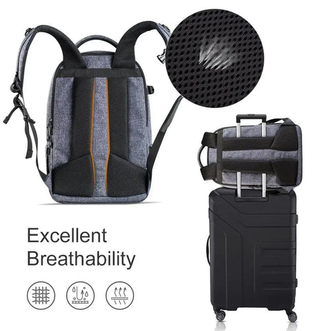 Back view of Beast Pro Camera Backpack with breathable mesh, ergonomic shoulder straps, and luggage strap attached to a suitcase.
